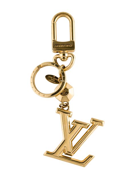 lv facettes bag charm & key holder|louis vuitton luggage charms.